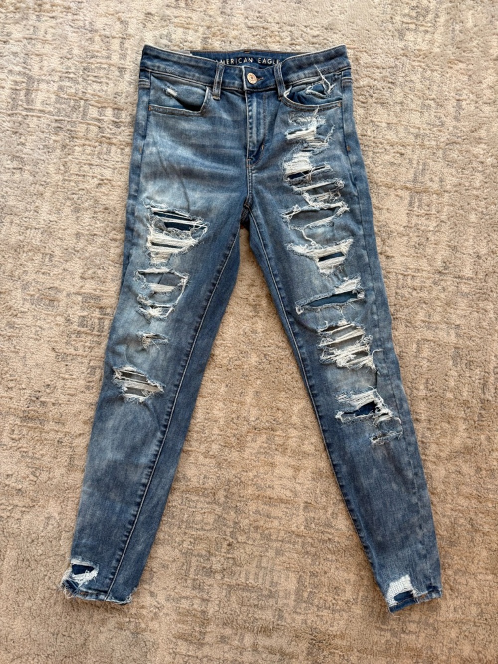 American Eagle Outfitters Women's Distressed Hi-Rise Jeggings.